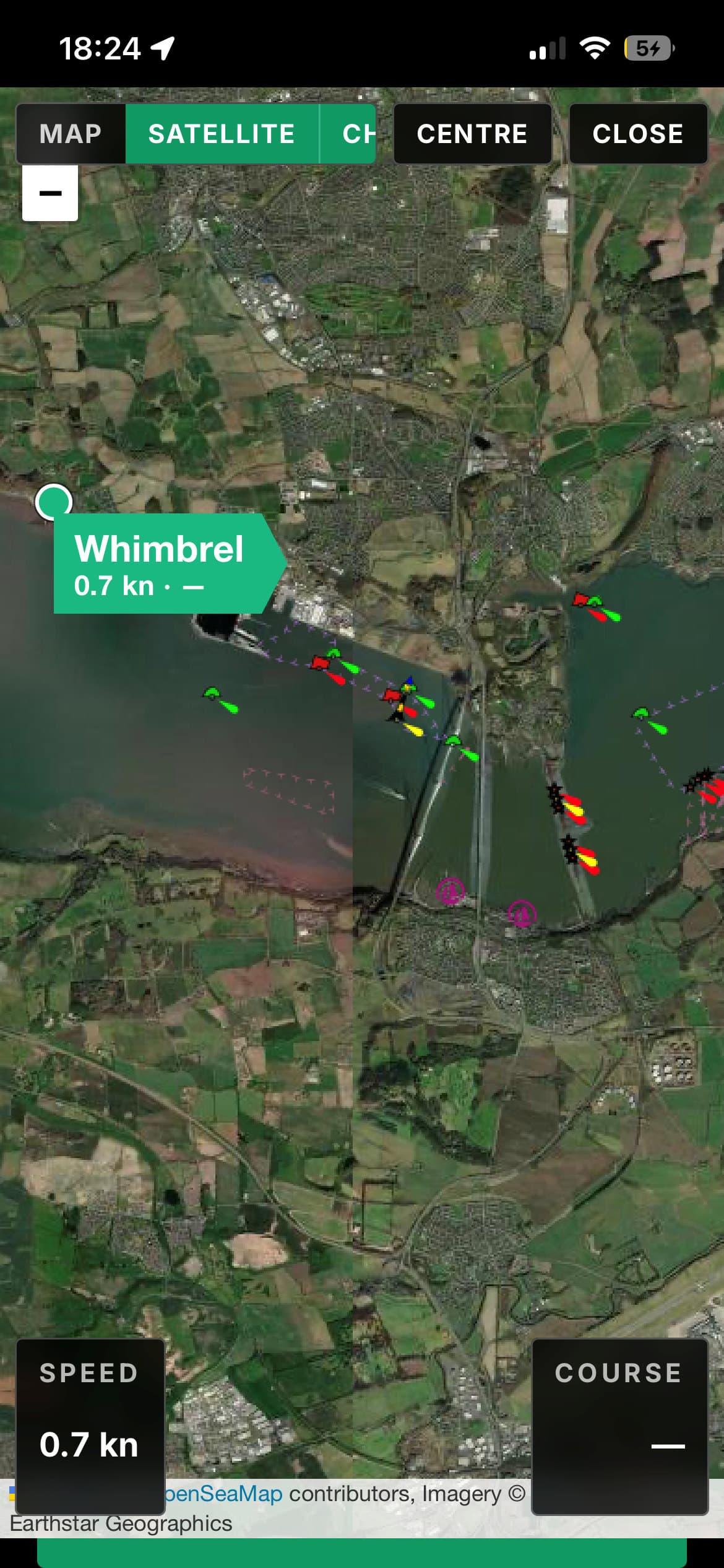 The chart full screen: satellite imagery of the Firth of Forth with the OpenSeaMap seamarks drawn over it, buoys and beacons, and the boat marked with her speed